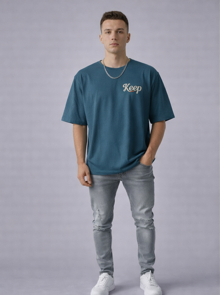Men’s Teal Blue Oversized T-Shirt with “Keep Flying” Butterfly Back Gr